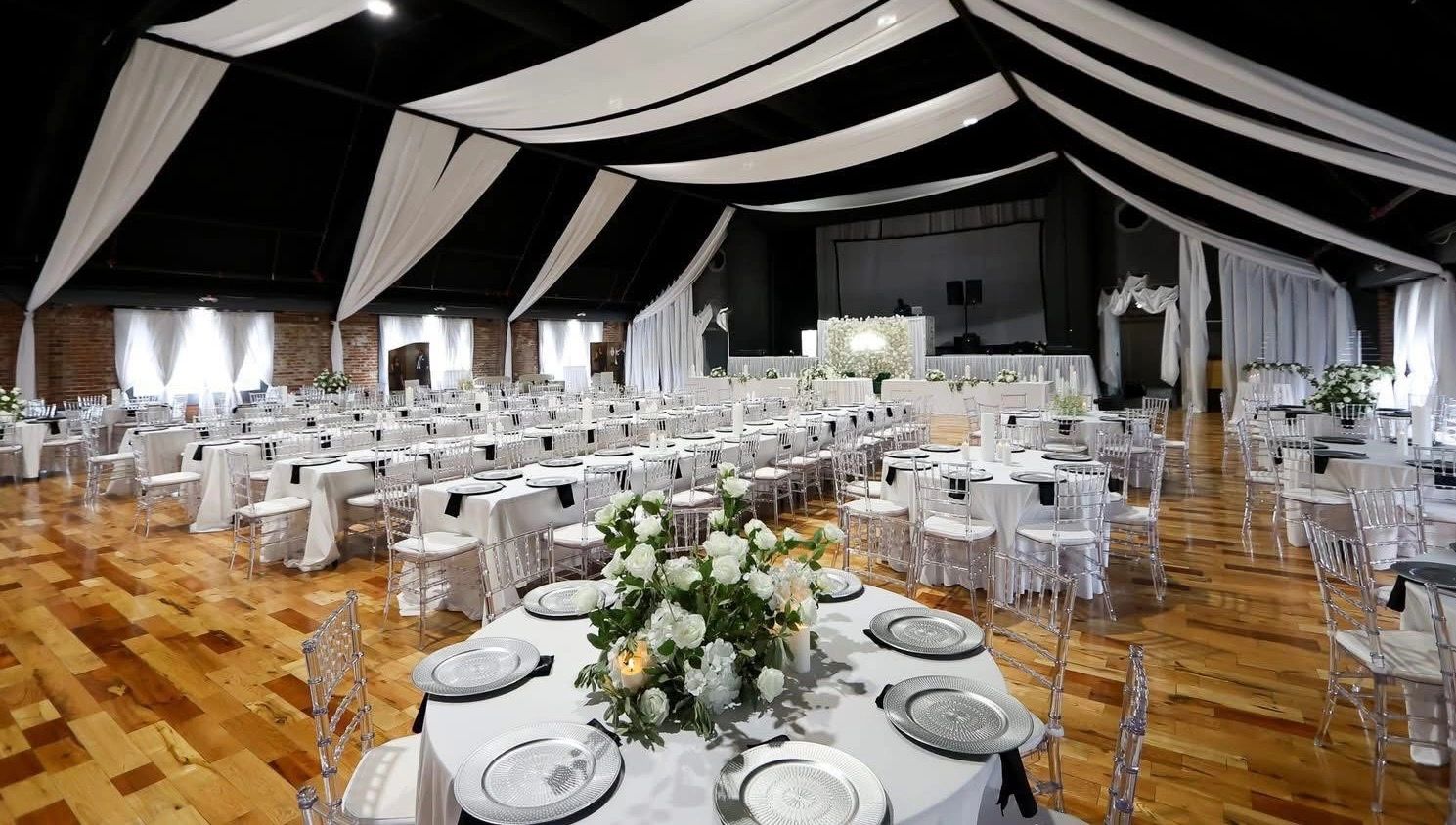 The Cadillac Showroom set for a dinner under a draped ceiling